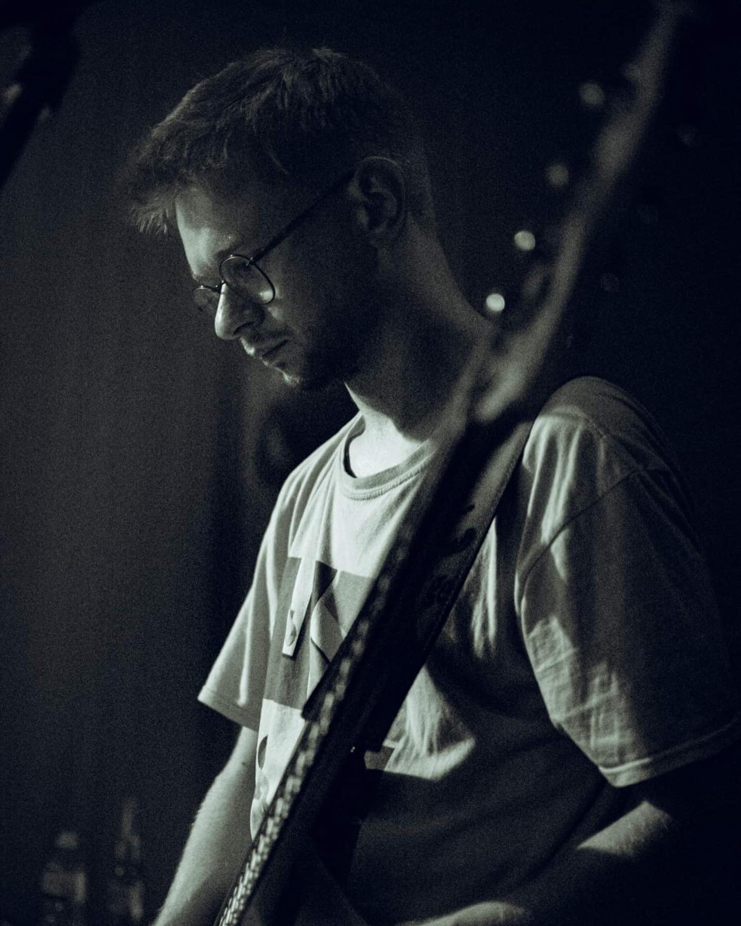 George Burrage playing electric bass at The White Hotel